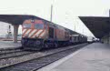 CP 1967 + mixed freight from Santarem to Contumil at Porto Campanha on 18 March 2002