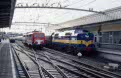 Alpen Express hectic on an early Sunday morning in Venlo (NL): ACTS 1253 just coupled onto train 13216 (Seefeld, AU - Utrecht Centraal), DB 110 299 arrives train 13206 (Brig, CH - Utrecht Centraal) while DB 110 158 + 110 417 go back empty to Germany, February 2002
