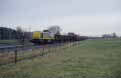 NMBS 7733 + local freight 95400 (Clabecq - Quenast) comes near Quenast, January 2002