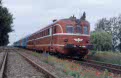 CFR 78 1017 + 78 1019 trail passenger train P 3113 (Timisoara Nord, RO - Oradea, RO) behind CFR 60 1192 and 7 CFR coaches at Nadab (RO) on 11 June 2002