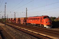 MAV Nosztalgia M61.006 provides the traction for a ballast train at Emod on 20 May 2014.