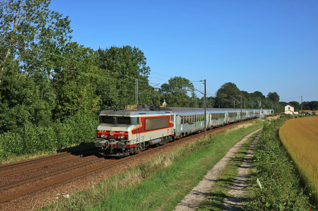SNCF 15014 pulls nince SNCF Intercities coaches as TER 3121 (Paris St. Lazare - Le Havre) just east of Motteville on 21 July 2020.