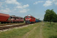 BDZ 06.102 with freight train from the Haskovo weigh bridge to Haskovo (BG) crosses BDZ 06.094 + 4 BDZ as train Ord 40161 (Dimitrovgrad, BG - Momchilgrad, BG) at Haskovo (BG), 27 June 2005.