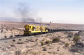 FERRONOR 425 + 421 + empty iron ore train (Huasco - Los Colorados) at Vallenar, 21 November 2005