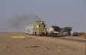 SNIM CC04 + ex-FNM doubledeck motorcar + ex-NMBS I3 coach (Ben Amira - Choum) at Ben Amira (Mauritania) on 25 December 2001
