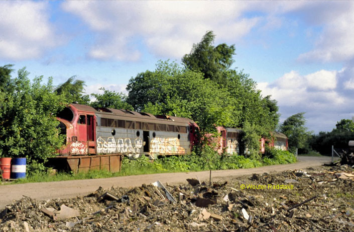 From left to right: ex-DSB MY 1139 + MY 1102 + MV 1144 at Hensat Henriksen breaking yard at rhus (DK) on 25 May 2004.